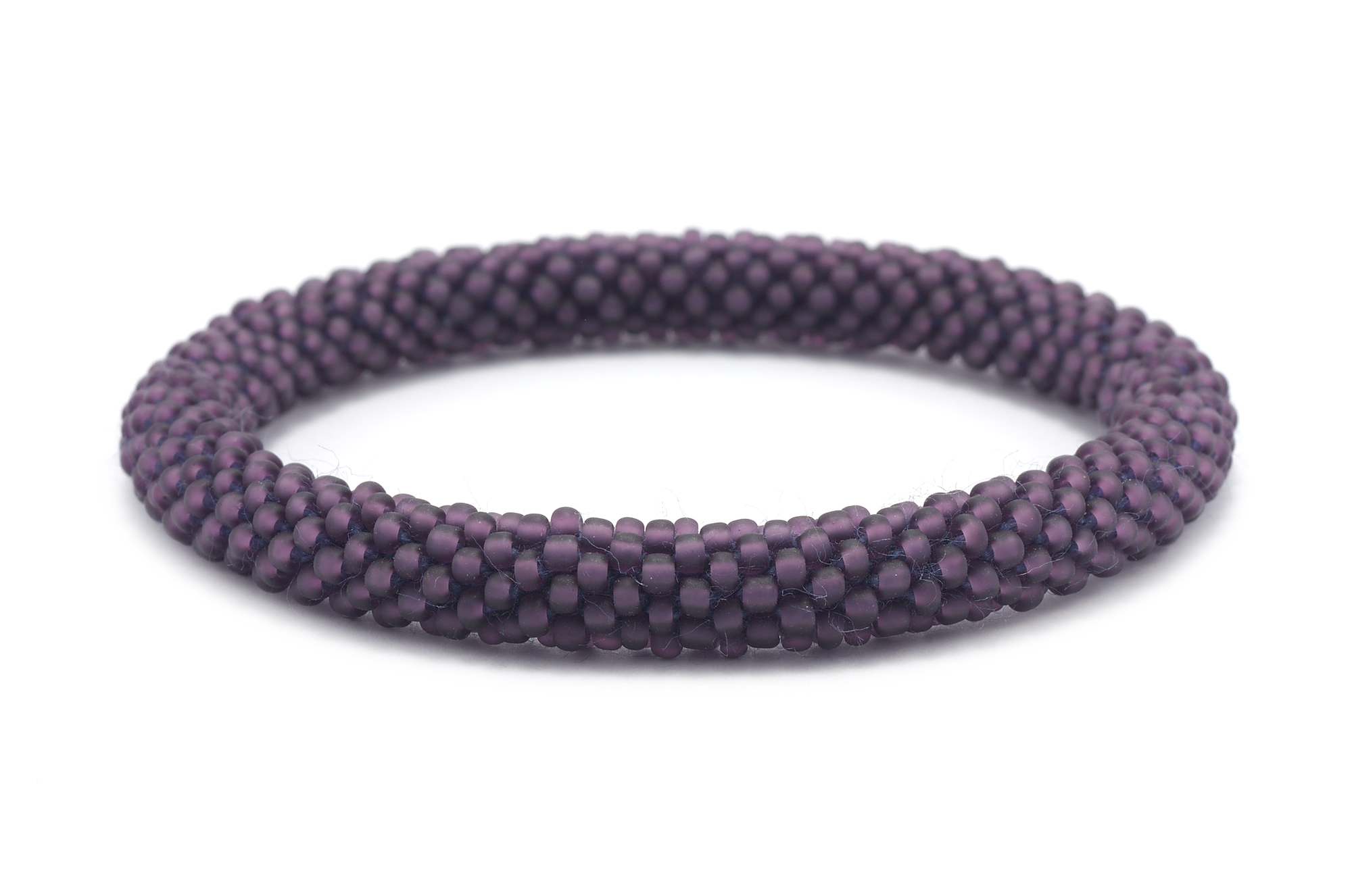 Handmade glass bead bracelet from Nepal, featuring a roll design. Also known as a beaded bracelet, seed bead bracelet, beach glass bracelet, or sea glass bracelet