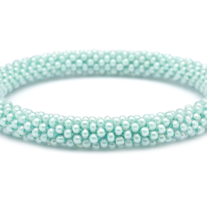 Handmade glass bead bracelet from Nepal, featuring a roll design. Also known as a beaded bracelet, seed bead bracelet, beach glass bracelet, or sea glass bracelet