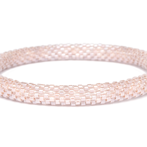 Handmade glass bead bracelet from Nepal, featuring a roll design. Also known as a beaded bracelet, seed bead bracelet, beach glass bracelet, or sea glass bracelet