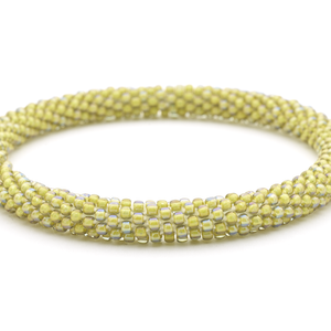 Handmade glass bead bracelet from Nepal, featuring a roll design. Also known as a beaded bracelet, seed bead bracelet, beach glass bracelet, or sea glass bracelet