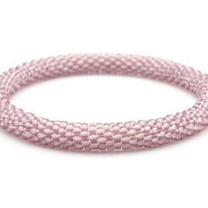 Handmade glass bead bracelet from Nepal, featuring a roll design. Also known as a beaded bracelet, seed bead bracelet, beach glass bracelet, or sea glass bracelet