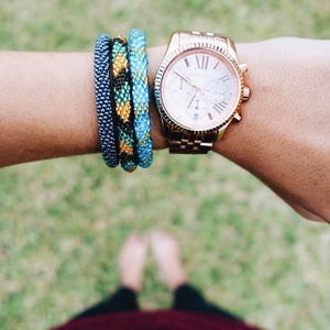 Handmade glass bead bracelet from Nepal, featuring a roll design. Also known as a beaded bracelet, seed bead bracelet, beach glass bracelet, or sea glass bracelet.