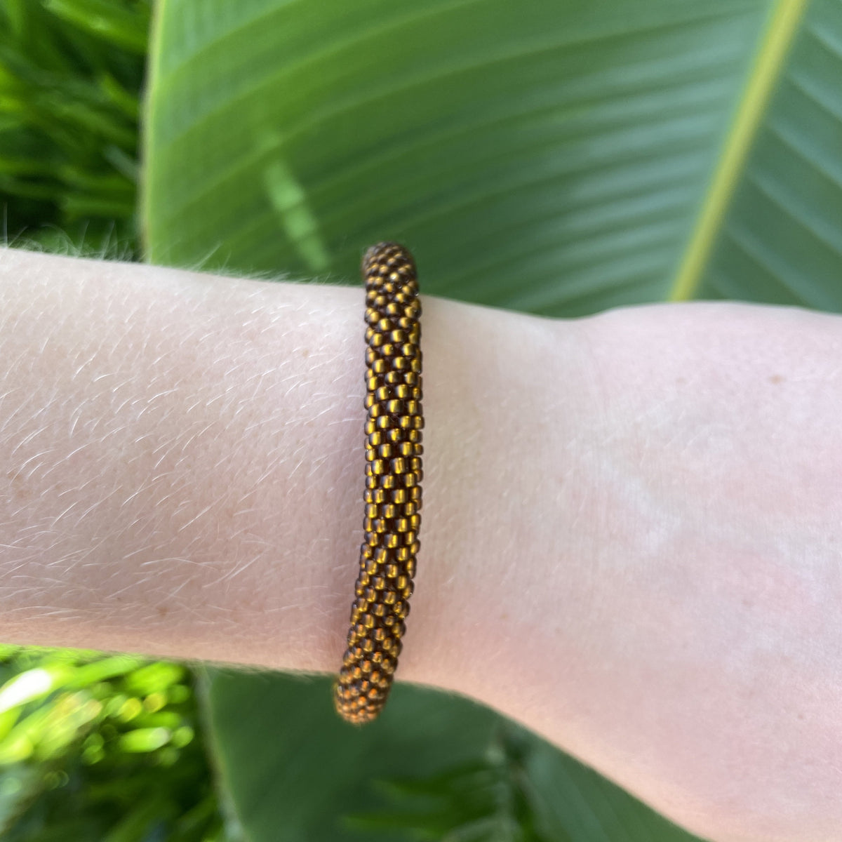 Handmade glass bead bracelet from Nepal, featuring a roll design. Also known as a beaded bracelet, seed bead bracelet, beach glass bracelet, or sea glass bracelet