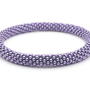 Handmade glass bead bracelet from Nepal, featuring a roll design. Also known as a beaded bracelet, seed bead bracelet, beach glass bracelet, or sea glass bracelet