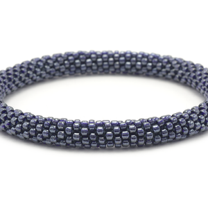 Handmade glass bead bracelet from Nepal, featuring a roll design. Also known as a beaded bracelet, seed bead bracelet, beach glass bracelet, or sea glass bracelet