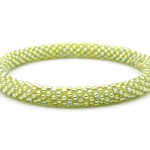 Handmade glass bead bracelet from Nepal, featuring a roll design. Also known as a beaded bracelet, seed bead bracelet, beach glass bracelet, or sea glass bracelet