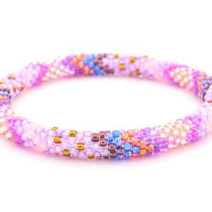 Handmade glass bead Pink , Purple , Blue , Iridescent Red , Golden Brown , Plum , Rose Gold bracelet from Nepal, featuring a roll design. Also known as a beaded bracelet, seed bead bracelet, beach glass bracelet, or sea glass bracelet