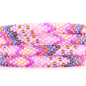 Handmade glass bead Pink , Purple , Blue , Iridescent Red , Golden Brown , Plum , Rose Gold bracelet from Nepal, featuring a roll design. Also known as a beaded bracelet, seed bead bracelet, beach glass bracelet, or sea glass bracelet