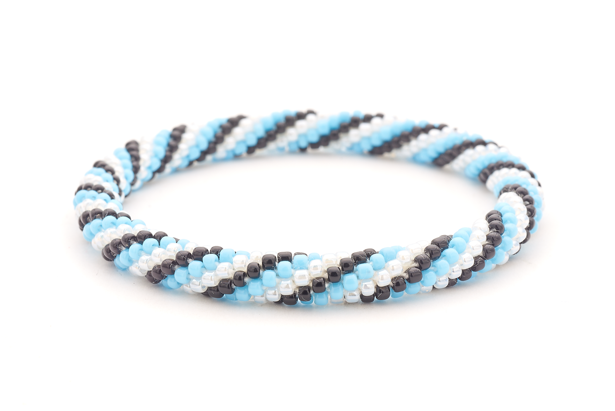 Handmade glass bead blue, black, white bracelet from Nepal, featuring a roll design. Also known as a beaded bracelet, seed bead bracelet, beach glass bracelet, or sea glass bracelet