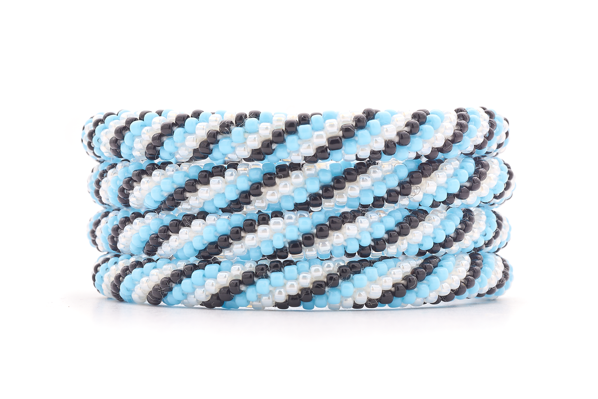 Handmade glass bead blue, black, white bracelet from Nepal, featuring a roll design. Also known as a beaded bracelet, seed bead bracelet, beach glass bracelet, or sea glass bracelet