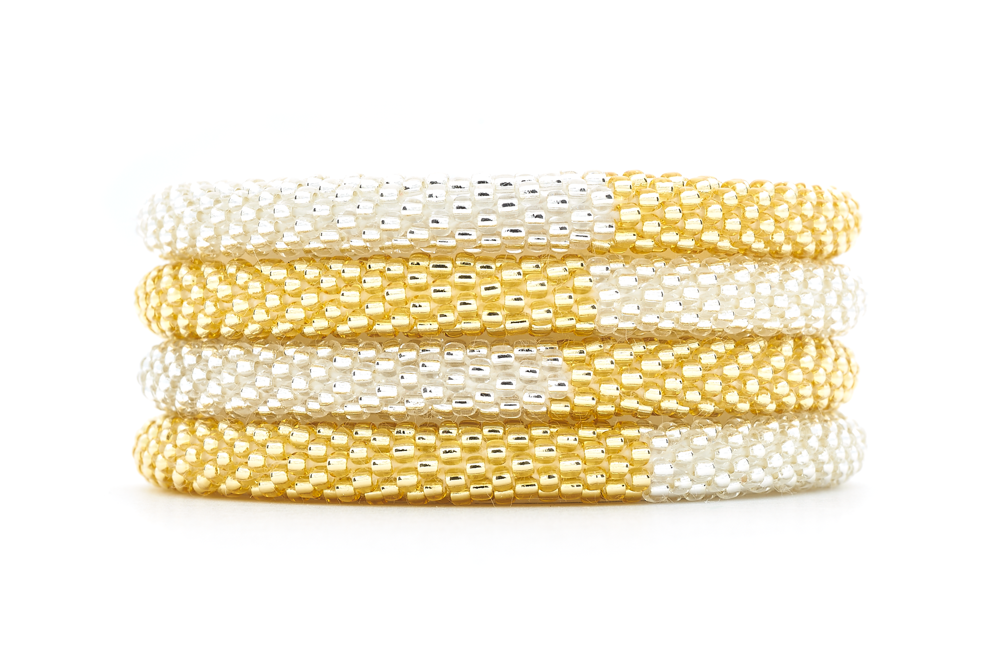 Handmade glass bead clear and champagne gold bracelet from Nepal, featuring a roll design. Also known as a beaded bracelet, seed bead bracelet, beach glass bracelet, or sea glass bracelet