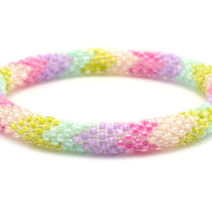 Handmade glass bead pink, purple, mint, green, pink bracelet from Nepal, featuring a roll design. Also known as a beaded bracelet, seed bead bracelet, beach glass bracelet, or sea glass bracelet.