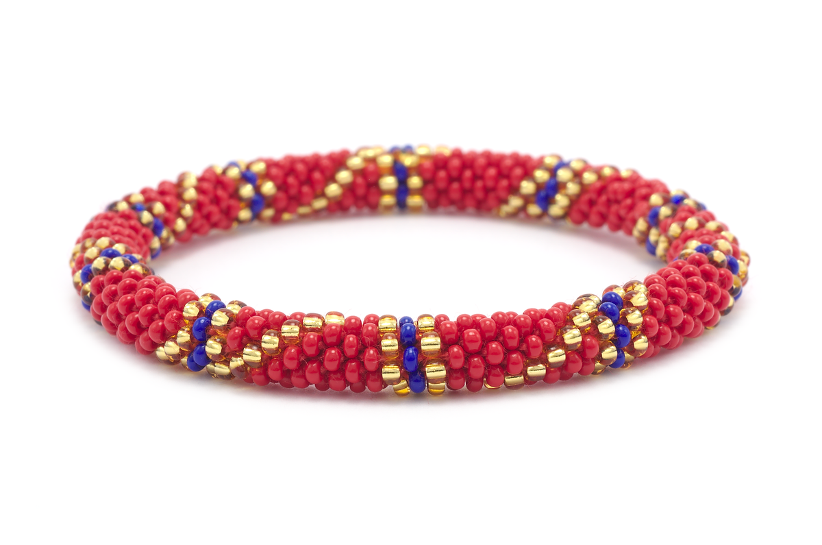 Handmade glass bead red, blue, gold bracelet from Nepal, featuring a roll design. Also known as a beaded bracelet, seed bead bracelet, beach glass bracelet, or sea glass bracelet.